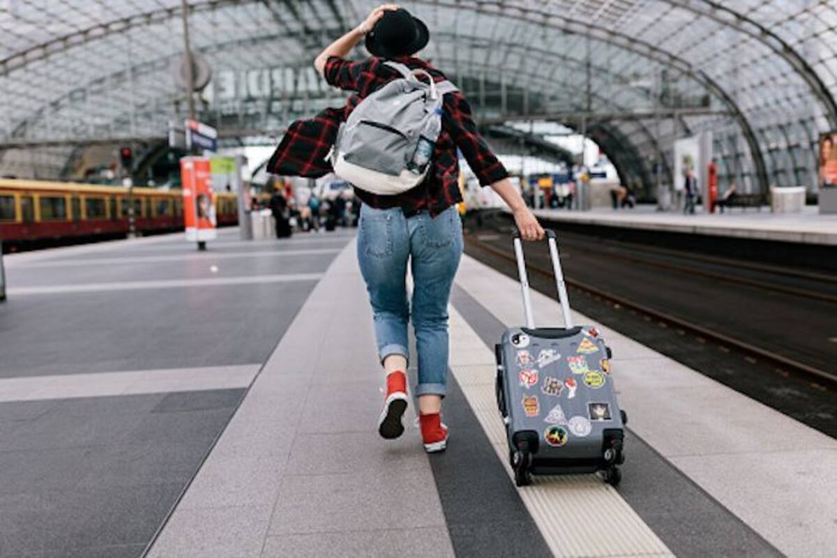 Image Showing Solo Woman Traveller In Railway Station